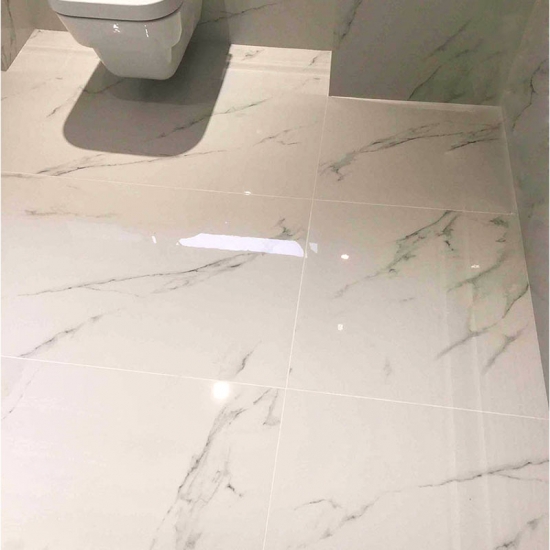 Polished calacatta marble bathroom